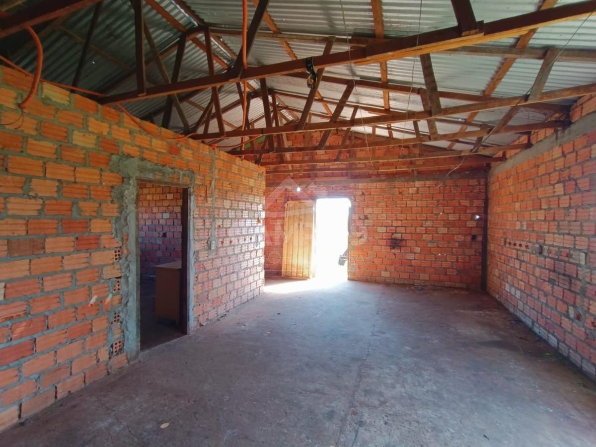 VENDO TERRENO CON CASA A TERMINAR
